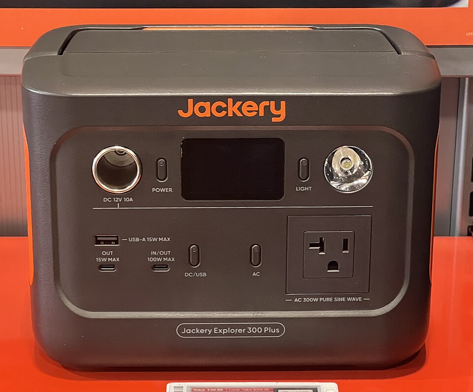 A dark gray Jackery Explorer 300 Plus power station with a display, USB ports and an AC outlet on the front, for storm prep in Panama City, FL